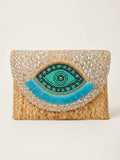 The luxe Evil Eye Woven Clutch