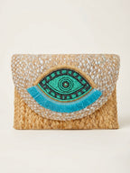The luxe Evil Eye Woven Clutch